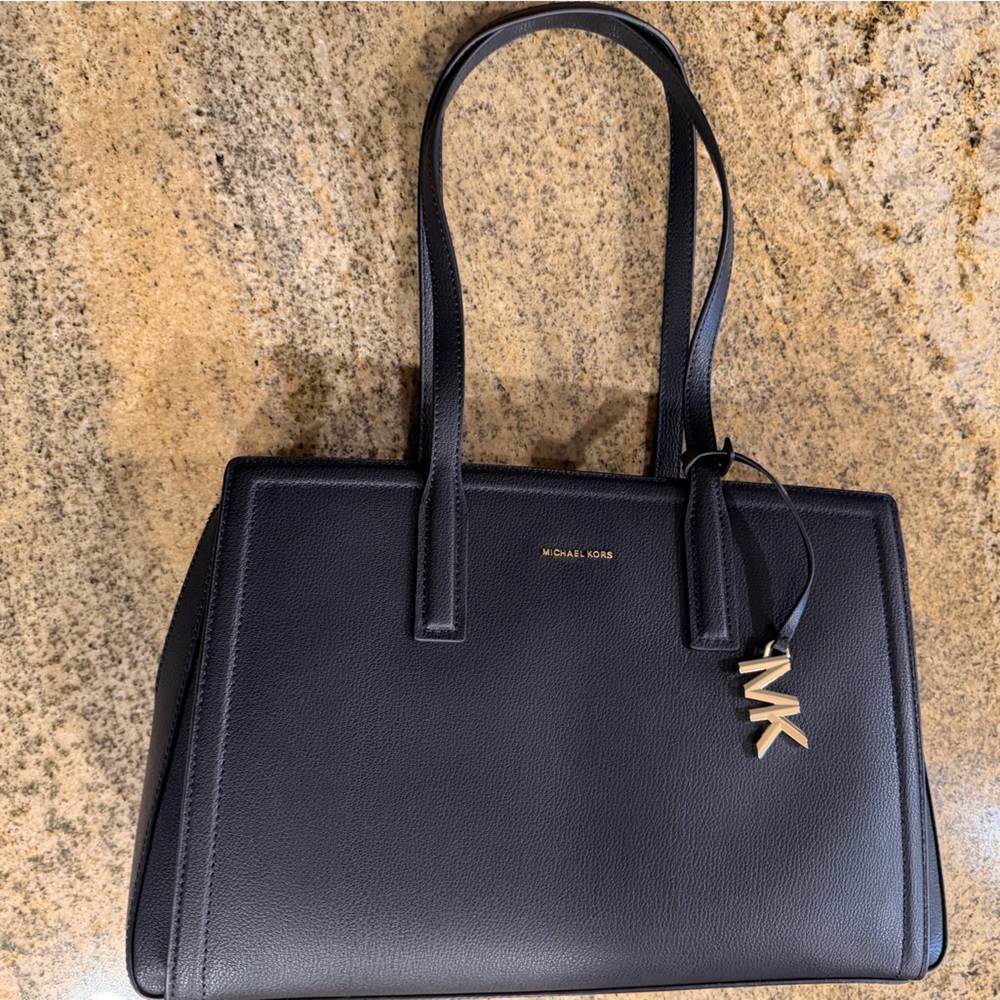 Michael Kors Laila Leather Tote Bag NWT. Black and all leather. Very nice bag.